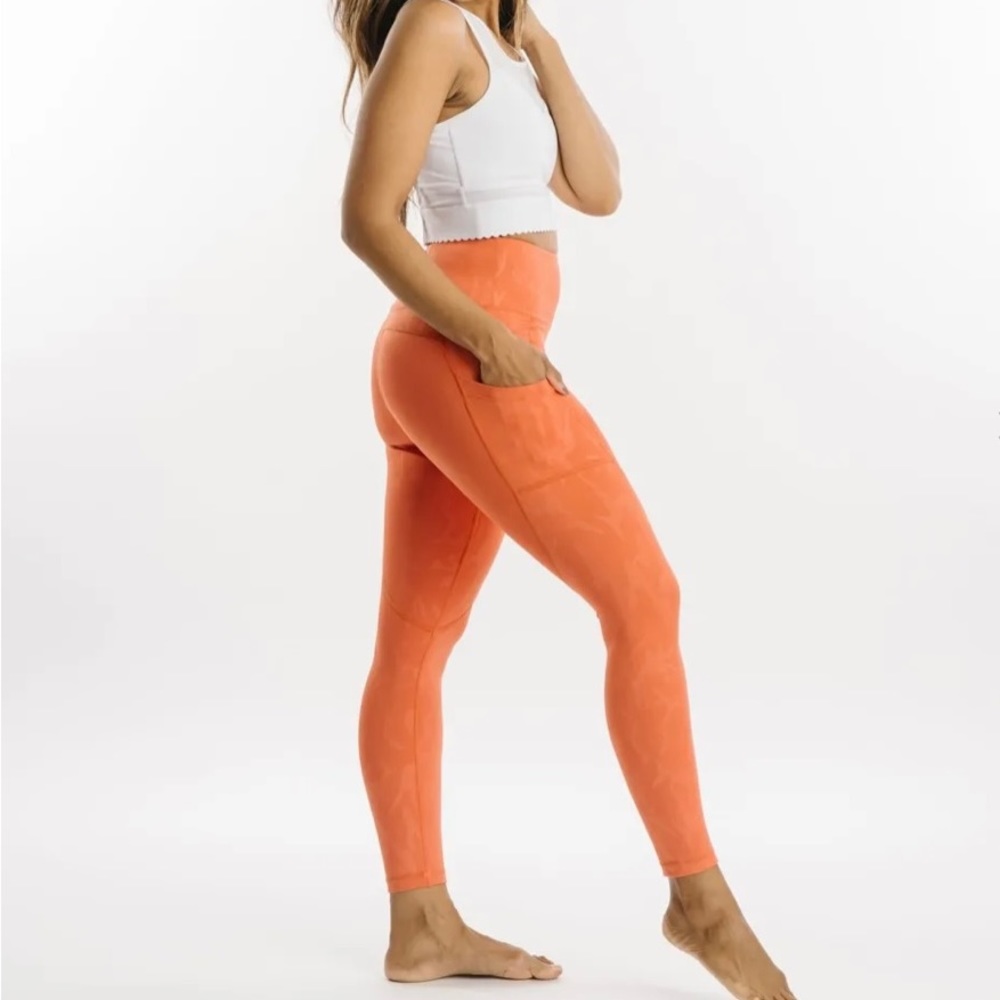 Tangerine cream light n tights. Brand new never worn.